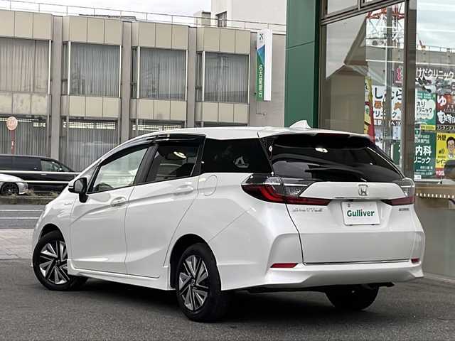ホンダ シャトル ハイブリッド X ホンダセンシング 愛知県 2022(令4)年 2.4万km プラチナホワイトパール /禁煙//ワンオーナー//純正メモリナビ//フルセグ//CD/DVD/FM/AM/ipod/SD/USB/BT/AUX//バックカメラ//ホンダセンシング//ACC/LKAS/路外逸脱抑制/CMBS/誤発進抑制機能//パドルシフト//ビルトインETC//ハーフレザーシート//シートヒーター//前後ドライブレコーダー//オートリトラクタブルウィンカーミラー//LEDオートライト//フォグランプ//チップアップシート//防眩ミラー//ISOFIX//スポーツモード/エコモード//純正フロアマット/ドアバイザー//プッシュスタート//スマートキー//取扱説明書//保証書//記録簿R4-R7//スペアキー有