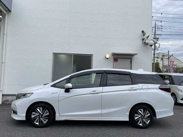 ホンダ シャトル ハイブリッド X ホンダセンシング 愛知県 2022(令4)年 2.4万km プラチナホワイトパール /禁煙//ワンオーナー//純正メモリナビ//フルセグ//CD/DVD/FM/AM/ipod/SD/USB/BT/AUX//バックカメラ//ホンダセンシング//ACC/LKAS/路外逸脱抑制/CMBS/誤発進抑制機能//パドルシフト//ビルトインETC//ハーフレザーシート//シートヒーター//前後ドライブレコーダー//オートリトラクタブルウィンカーミラー//LEDオートライト//フォグランプ//チップアップシート//防眩ミラー//ISOFIX//スポーツモード/エコモード//純正フロアマット/ドアバイザー//プッシュスタート//スマートキー//取扱説明書//保証書//記録簿R4-R7//スペアキー有
