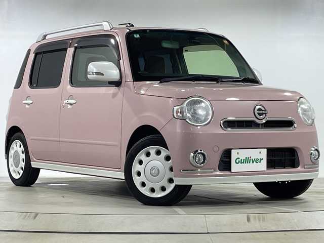 ダイハツ ミラ ココア プラスX スペシャルコーデ 神奈川県 2014(平26)年 4.2万km ムースピンクパール 社外７型ナビ（KXMG710W）/(ＣＤ/ＤＶＤ/Ｂｌｕｅｔｏｏｔｈ/USB/フルセグＴＶ)/バックカメラ/ルーフレール/ＨＩＤヘッドライト/フォグランプ/360度ドライブレコーダー/スマートキー/リア７面フィルム施工/ドアバイザー/新車時保証書/取扱説明書/スペア板キー