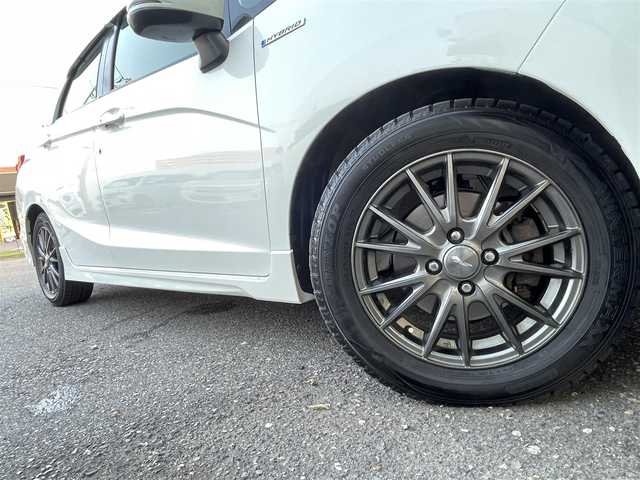 ホンダ シャトル ハイブリッド X 新潟県 2015(平27)年 13.9万km ホワイトオーキッドパール ワンオーナー/メモリナビ/ワンセグテレビ/バックカメラ/ドアバイザー/プッシュスタート/クルーズコントロール/ECON