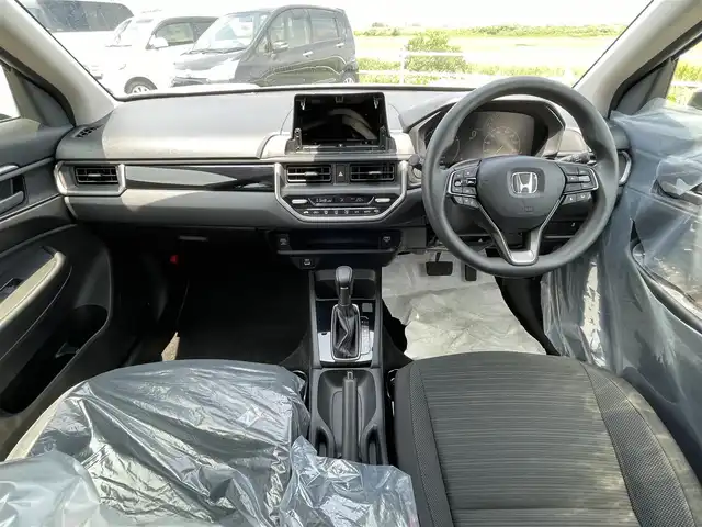 ホンダ ＷＲ－Ｖ X 佐賀県 2025(令7)年 0.1千km プラチナホワイトパール 登録済未使用車/登録時走行距離36km/Honda SENSING 全車標準装備/・衝突軽減ブレーキ（対歩行者・対車両）/・誤発進抑制機能（前後）/・ACC（アダプティブクルーズコントロール）/・車線維持支援システム（LKAS）/・路外逸脱抑制機能/・先行車発進お知らせ機能/・オートハイビーム/ホンダコネクトforギャザズナビパッケージ/スマートキー/・スペアキー1本