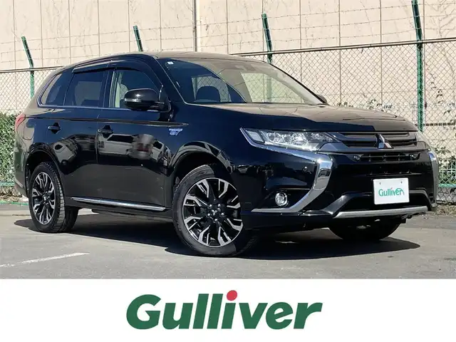 三菱 アウトランダー ＰＨＥＶ G セーフティパッケージ 東京都 2017(平29)年 5.9万km アメジストブラック ４WD車/社外メモリナビ＆フルセグ/・BluetoothAudio/・CD/SD/DVD/FM/AM/ｅアシストシステム　/（予防安全技術）/・衝突被害軽減ブレーキ/・車線逸脱警報/・レーダークルーズコントロール/・オートマチックハイビーム/ブラック合皮スエード調コンビシート/・D席パワーシート/・シートヒーター/アラウンドビューモニター /OP装備/・パーキングセンサー /・誤発進抑制機能 /・後側方車両検知警報 /・後退時車両検知警報 /LEDヘッドライト /ステアリングヒーター/プッシュエンジンスタート/保証書＆取説