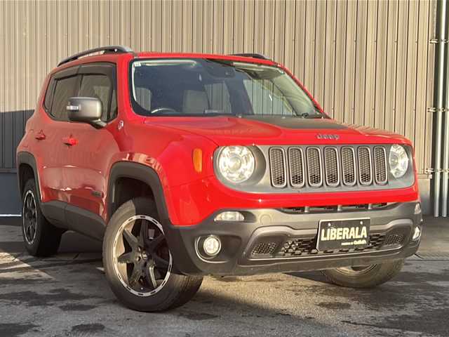 クライスラー・ジープ ジープ レネゲード トレイルホーク 青森県 2015(平27)年 17.5万km 赤 Carrozzeria製ポータブルメモリーナビ（AVIC-MRP600）/１７インチ純正AW付サマータイヤ積載/４WD/革巻きステアリング/ワンセグテレビ/バックカメラ/後方コーナーセンサー/ABS/横滑り防止装置/ダウンヒルアシストコントロール/車線逸脱防止/オートライト/純正フロアマット/MTモード付AT/クルーズコントロール/ETC/ダブルエアバッグ/ルーフレール