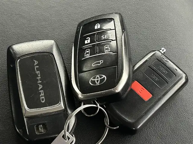 トヨタ アルファード S Cパッケージ 道央・札幌 2016(平28)年 7.1万km ラグジュアリーホワイトパールクリスタルシャインガラスフレーク ・４WD/・寒冷地仕様/・モデリスタエアロ/・モデリスタグリル/・純正SDナビ/　CD／DVD／Bluetooth／フルセグ/・純正フリップダウンモニター/・純正ビルトインETC/・社外前後ドライブレコーダー/・純正エンジンスターター/・両側パワースライドドア/・電動リアゲート/・クルーズコントロール/・アイドリングストップ/・横滑り防止装置/・ステアリングヒーター/・前後コーナーセンサー/・オートブレーキホールド/・パワーシート/・運転席シートメモリー/・自動防眩ミラー/・LEDヘッドライト/・フォグライト/・スマートキー/・プッシュスタート