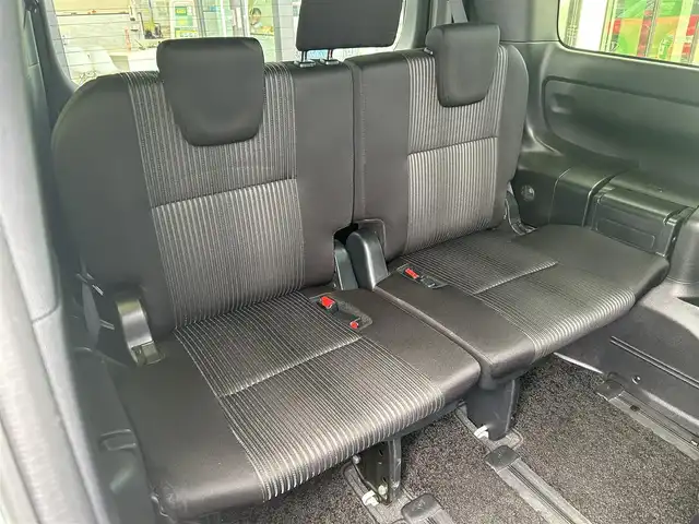 トヨタ ヴォクシー ZS 煌 愛媛県 2018(平30)年 8.9万km ホワイトパールクリスタルシャイン ワンオーナー/登録時走行距離：88485km/純正ナビ/Bluetooth/バックカメラ/後部座席モニター/後部座席エアコン/サンシェード/純正ビルトインETC/横滑り防止装置/レーンキープアシスト/盗難防止装置/衝突軽減システム/LEDヘッドライト/両側パワースライドドア/エンジンスタートボタン/スマートキー/純正フロアマット