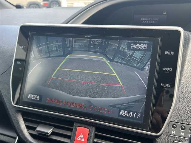 トヨタ ヴォクシー ZS 煌 徳島県 2018(平30)年 8.9万km ホワイトパールクリスタルシャイン ワンオーナー/純正ナビ/Bluetooth/バックカメラ/フリップダウンモニター/両側パワースライドドア/セーフティセンス/・プリクラッシュセーフティシステム/・レーンディパーチャーアラート/・オートマチックハイビーム/・先行車発進告知機能/クルーズコントロール/LEDヘッドライト/純正16インチAW/純正ビルトインETC2.0/革巻きステアリングホイール/左右独立温度調整オートエアコン/リアオートエアコン/サンシェード/横滑り防止装置/盗難防止装置/スマートエントリー/プッシュスタートシステム/純正フロアマット/登録時走行距離：88485km