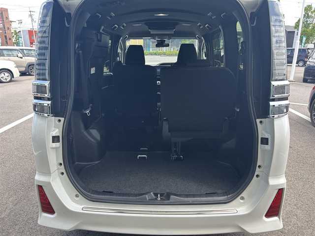 トヨタ ヴォクシー ZS 煌 徳島県 2018(平30)年 8.9万km ホワイトパールクリスタルシャイン ワンオーナー/純正ナビ/Bluetooth/バックカメラ/フリップダウンモニター/両側パワースライドドア/セーフティセンス/・プリクラッシュセーフティシステム/・レーンディパーチャーアラート/・オートマチックハイビーム/・先行車発進告知機能/クルーズコントロール/LEDヘッドライト/純正16インチAW/純正ビルトインETC2.0/革巻きステアリングホイール/左右独立温度調整オートエアコン/リアオートエアコン/サンシェード/横滑り防止装置/盗難防止装置/スマートエントリー/プッシュスタートシステム/純正フロアマット/登録時走行距離：88485km