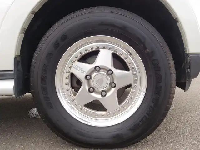 三菱 パジェロ ロング エクシード 山形県 2006(平18)年 10.1万km ウォームホワイトパール 4WD/純正フリップダウンモニター/ロックフォードアコースティックデザインプレミアムサウンドシステム/純正HDDナビ/　　【CD DVD フルセグ MSV】/バックカメラ/クルーズコントロール/HIDオートヘッドライト/17インチアルミホイール/ドライブレコーダー/ステアリングスイッチ/MTモード付AT/電動格納ウィンカーミラー/フォグランプ/リモコンキー/ETC