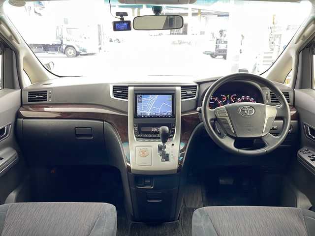 トヨタ ヴェルファイア 2．4Z 兵庫県 2012(平24)年 10.6万km ホワイトパールクリスタルシャイン ・純正ナビ/CD/DVD/MSV/BT/TV/・バックカメラ/・前方ドライブレコーダー/・左右独立エアコン/・MTモード付AT/・ビルトインETC/・革巻ステアリング/・ステアリングスイッチ/・nanoe/・クリアランスソナー/・両側パワースライドドア/・トランクイージークローザー/・オールオートパワーウィンドウ/・横滑り防止装置/・ウインカーミラー/・プッシュスタート/・後席エアコン/・HIDヘッドライト/・フォグランプ/・電動格納ミラー/・スマートキー/・スペアキー/・純正フロアマット/・純正アルミホイール/・取扱説明書/・保証書