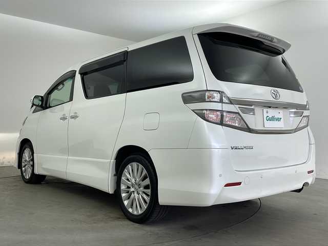 トヨタ ヴェルファイア 2．4Z 兵庫県 2012(平24)年 10.6万km ホワイトパールクリスタルシャイン ・純正ナビ/CD/DVD/MSV/BT/TV/・バックカメラ/・前方ドライブレコーダー/・左右独立エアコン/・MTモード付AT/・ビルトインETC/・革巻ステアリング/・ステアリングスイッチ/・nanoe/・クリアランスソナー/・両側パワースライドドア/・トランクイージークローザー/・オールオートパワーウィンドウ/・横滑り防止装置/・ウインカーミラー/・プッシュスタート/・後席エアコン/・HIDヘッドライト/・フォグランプ/・電動格納ミラー/・スマートキー/・スペアキー/・純正フロアマット/・純正アルミホイール/・取扱説明書/・保証書