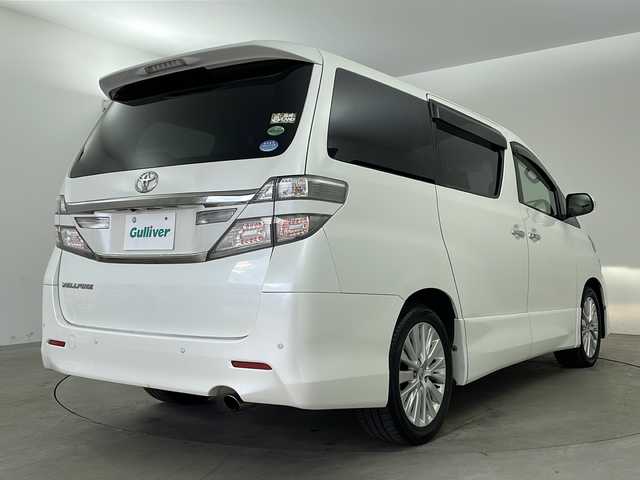 トヨタ ヴェルファイア 2．4Z 兵庫県 2012(平24)年 10.6万km ホワイトパールクリスタルシャイン ・純正ナビ/CD/DVD/MSV/BT/TV/・バックカメラ/・前方ドライブレコーダー/・左右独立エアコン/・MTモード付AT/・ビルトインETC/・革巻ステアリング/・ステアリングスイッチ/・nanoe/・クリアランスソナー/・両側パワースライドドア/・トランクイージークローザー/・オールオートパワーウィンドウ/・横滑り防止装置/・ウインカーミラー/・プッシュスタート/・後席エアコン/・HIDヘッドライト/・フォグランプ/・電動格納ミラー/・スマートキー/・スペアキー/・純正フロアマット/・純正アルミホイール/・取扱説明書/・保証書