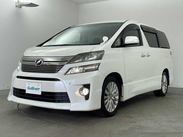 トヨタ ヴェルファイア 2．4Z 兵庫県 2012(平24)年 10.6万km ホワイトパールクリスタルシャイン ・純正ナビ/CD/DVD/MSV/BT/TV/・バックカメラ/・前方ドライブレコーダー/・左右独立エアコン/・MTモード付AT/・ビルトインETC/・革巻ステアリング/・ステアリングスイッチ/・nanoe/・クリアランスソナー/・両側パワースライドドア/・トランクイージークローザー/・オールオートパワーウィンドウ/・横滑り防止装置/・ウインカーミラー/・プッシュスタート/・後席エアコン/・HIDヘッドライト/・フォグランプ/・電動格納ミラー/・スマートキー/・スペアキー/・純正フロアマット/・純正アルミホイール/・取扱説明書/・保証書