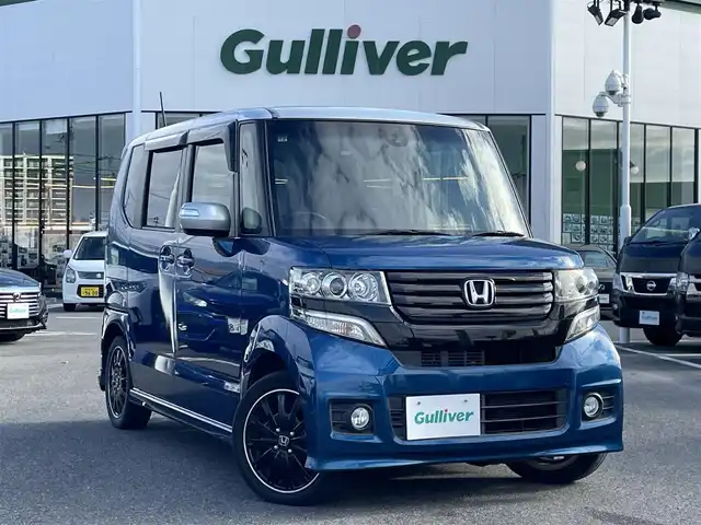 ホンダ Ｎ ＢＯＸ カスタム ターボ SSパッケージ 長崎県 2014(平26)年 8.4万km 青／シルバー 純正SDナビ/CD/DVD/BT/USB/フルセグTV/バックカメラ/両側パワースライドドア/ステアリングスイッチ/クルーズコントロール/パドルシフト/CTBA/LEDヘッドライト/オートライト