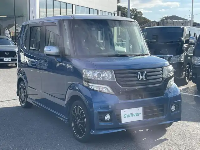 ホンダ Ｎ ＢＯＸ カスタム ターボ SSパッケージ 長崎県 2014(平26)年 8.4万km 青／シルバー 純正SDナビ/CD/DVD/BT/USB/フルセグTV/バックカメラ/両側パワースライドドア/ステアリングスイッチ/クルーズコントロール/パドルシフト/CTBA/LEDヘッドライト/オートライト
