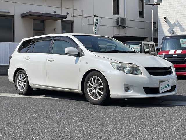 トヨタ カローラ フィールダー X HID リミテッド 岡山県 2010(平22)年 14.4万km ホワイトパールクリスタルシャイン 登録時走行距離143259km/社外SDナビ/(AM/FM/DISC/TV/AUX)/ETC/パワーステアリング/パワーウィンドウ/純正フロアマット/電動格納ミラー/社外１５インチアルミホイール/オートライト/保証書/取扱説明書/記録簿/キセノンヘッドライト/フルフラットシート