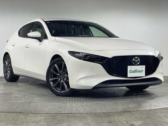 マツダ マツダ３ファストバック 20S Lパッケージ 神奈川県 2021(令3)年 4.8万km スノーフレイクホワイトパールマイカ I-ACTIVSENSE/純正ナビ/Bluetooth/CD DVD/全方位カメラ/プレミアムサウンドBOSE/レザーシート/パワーシート/シートヒーター/メモリーシート/ETC/MTモード/オートホールド/革ステアリング/ステアリングスイッチ/パドルシフト/オートライト/ステアリングヒーター/アイドリングストップ/コーナーセンサー/横滑り防止装置/ブラインドスポットモニター/LEDヘッドライト/格納ミラー/ウィンカーミラー/純正フロアマット/ヘッドアップディスプレイ