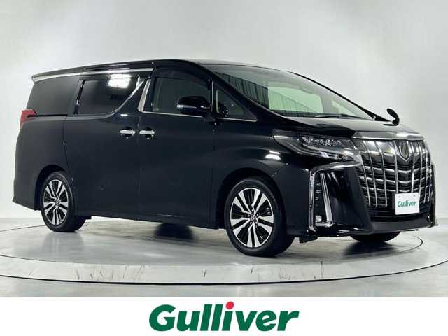 トヨタ アルファード S Cパッケージ 佐賀県 2019(令1)年 3.8万km ブラック 社外11型ナビ/（ＡＭ/ＦＭ/CD/DVD/Bluetooth/フルセグTV）/後席12.8型モニター /バックカメラ/クルーズコントロール(追従あり)/前後ドライブレコーダー/両側パワースライドドア/衝突被害軽減システム/セーフティセンス/クリアランスソナー/レーンアシスト/エアシート/シートヒーター/ステアリングヒーター/前席・セカンドシートパワーシート/オットマン/ビルトインETC/デジタルインナーミラー/ブラインドスポットモニター/LEDヘッドライト/フォグランプ/ダブルエアコン/盗難防止装置/横滑り防止装置/オートライト/オートマチックハイビーム/スマートキー/プッシュスタート/純正フロアマット/純正18インチアルミホイール/ステアリングスイッチ/電動格納ミラー/ドアバイザー