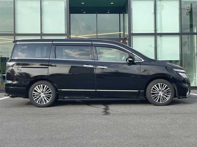 日産 エルグランド 250ハイウェイスター 愛媛県 2015(平27)年 6.4万km ファントムブラック 純正ナビ（Bluetooth/CD/DVD/AUX/フルセグTV)/リアエンターテインメント/バックカメラ/ビルドインETC/前方ドライブレコーダー/両側パワースライドドア/ハーフレザーシート/オットマン/100V充電/クルーズコントロール/純正18インチアルミホイール/純正フロアマット/純正ドアバイザー/LEDヘッドライト/フォグランプ/ABS/横滑り防止装置