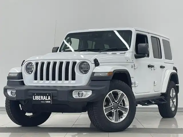 クライスラー・ジープ ラングラー アンリミテッド サハラ 岡山県 2020(令2)年 3.6万km ブライトホワイトクリアコート アダプティブクルーズコントロール/ブラインドスポットモニター/リアクロスパスディテクション/自動ブレーキ/パークアシスト/ブラックレザーシート/シートヒーター/ステアリングヒーター/純正ナビ/フルセグTV/アルパイン製９スピーカー/ＬＥＤヘッドライト/ＬＥＤフロントフォグ/オートライト/ＡｐｐｌｅＣａｒＰｌａｙ/Bluetooth/ＥＴＣ/社外サイドステップ