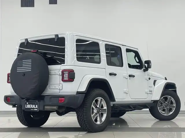 クライスラー・ジープ ラングラー アンリミテッド サハラ 岡山県 2020(令2)年 3.6万km ブライトホワイトクリアコート アダプティブクルーズコントロール/ブラインドスポットモニター/リアクロスパスディテクション/自動ブレーキ/パークアシスト/ブラックレザーシート/シートヒーター/ステアリングヒーター/純正ナビ/フルセグTV/アルパイン製９スピーカー/ＬＥＤヘッドライト/ＬＥＤフロントフォグ/オートライト/ＡｐｐｌｅＣａｒＰｌａｙ/Bluetooth/ＥＴＣ/社外サイドステップ