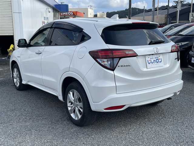 ホンダ ヴェゼル ハイブリッド X 神奈川県 2014(平26)年 14.8万km ホワイトオーキッドパール 【(株)IDOMが運営する【じしゃロン相模原店】の自社ローン対象車両になります。こちらは現金ご利用時の価格です。自社ローンご希望の方は別途その旨お申付け下さい。】/純正メモリナビ／Ｂｌｕｅｔｏｏｔｈ／ワンセグＴＶ／ＣＤ/バックカメラ/ＥＴＣ/スマートキー/プッシュエンジンスタート/前方ドライブレコーダー/オートライト/ＨＩＤ/パドルシフト/純正アルミホイール