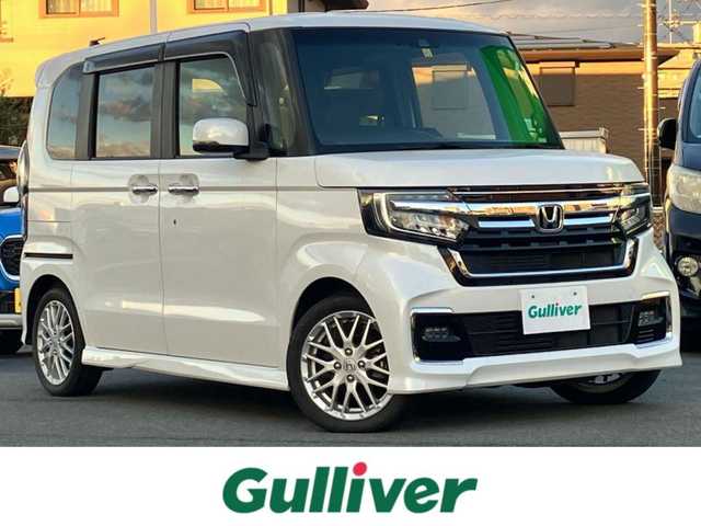 ホンダ Ｎ ＢＯＸ カスタム L ターボ 静岡県 2021(令3)年 3.4万km プラチナホワイトパール 純正8インチナビ（CD/DVD/BT/フルセグ）/バックカメラ/D席N席シートヒーター/パドルシフト/エンジンスタートボタン/パワーステアリング/パワーウィンドウ/アイドリングストップ/スマートキー/オートエアコン/レーダークルーズコントロール/USB入力端子/ETC/純正フロアマット/純正アルミホイール/ベンチシート/ハーフレザーシート/両側パワースライドドア/ABS/横滑り防止装置/コーナーセンサー/レーンキープアシスト/盗難防止装置/オートライト/オートマチックハイビーム/LEDヘッドライト/W+サイドエアバッグ/カーテンエアバッグ/衝突軽減システム