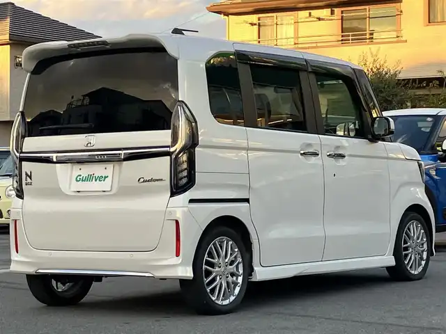 ホンダ Ｎ ＢＯＸ カスタム L ターボ 静岡県 2021(令3)年 3.4万km プラチナホワイトパール 純正8インチナビ（CD/DVD/BT/フルセグ）/バックカメラ/D席N席シートヒーター/パドルシフト/エンジンスタートボタン/パワーステアリング/パワーウィンドウ/アイドリングストップ/スマートキー/オートエアコン/レーダークルーズコントロール/USB入力端子/ETC/純正フロアマット/純正アルミホイール/ベンチシート/ハーフレザーシート/両側パワースライドドア/ABS/横滑り防止装置/コーナーセンサー/レーンキープアシスト/盗難防止装置/オートライト/オートマチックハイビーム/LEDヘッドライト/W+サイドエアバッグ/カーテンエアバッグ/衝突軽減システム
