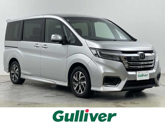 ホンダ ステップワゴン スパーダ ホンダセンシング 道央・札幌 2019(平31)年 8.6万km スーパープラチナメタリック ・４WD/ホンダセンシング/・衝突軽減ブレーキ〈CMBS〉/・LKAS〈車線維持支援システム〉/・レーダークルーズコントロール/・純正9インチインターナビ/・DVD.CD.SD.BT.フルセグ/・マルチビューカメラシステム/・両側パワースライドドア/・リアドアわくわくゲート/・フロントワイパーデアイサー/・LEDライト/オートハイビーム/・ミラーヒーター/・ビルとインETC/・スタッドレスタイヤ積込み有/・スマートキーｘ２