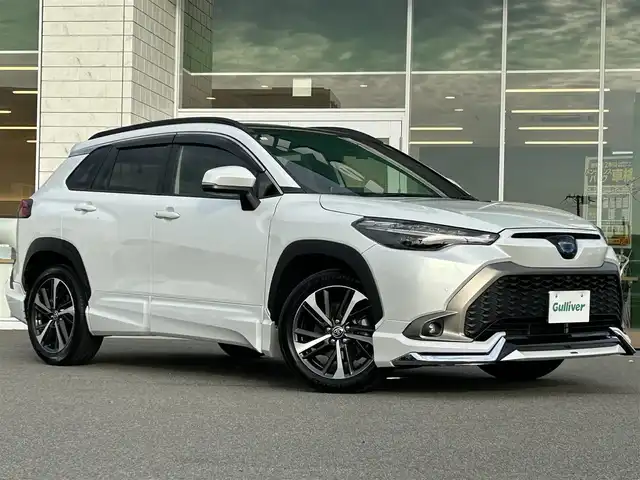 トヨタ カローラ クロス ハイブリッド Z 兵庫県 2023(令5)年 3.9万km プラチナホワイトパールマイカ 純正ナビ/フルセグ/BTオーディオ/パノラミックビューモニター/ビルトインETC/ドラレコ/トヨタセーフティー/オートホールド/シートヒーター/パワーバックドア/モデリスタエアロ（FSR）/ガラスルーフ/スペアキー×1/USBポート