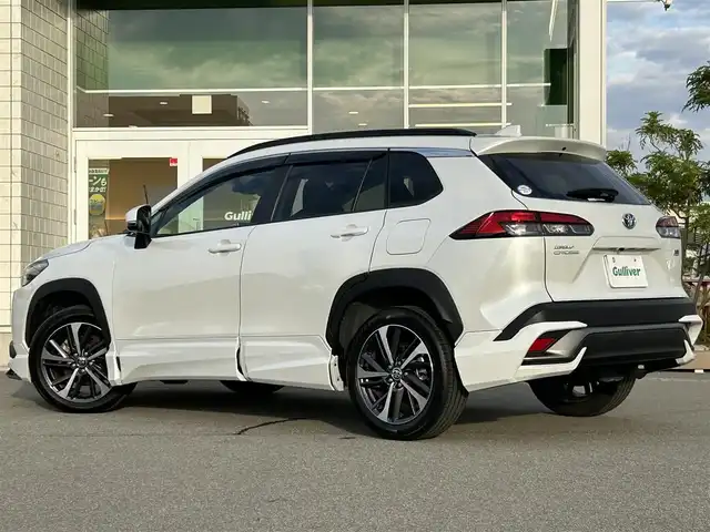 トヨタ カローラ クロス ハイブリッド Z 兵庫県 2023(令5)年 3.9万km プラチナホワイトパールマイカ 純正ナビ/フルセグ/BTオーディオ/パノラミックビューモニター/ビルトインETC/ドラレコ/トヨタセーフティー/オートホールド/シートヒーター/パワーバックドア/モデリスタエアロ（FSR）/ガラスルーフ/スペアキー×1/USBポート