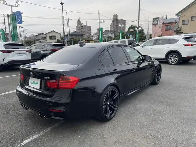 ＢＭＷ Ｍ３ セダン 神奈川県 2015(平27)年 5.4万km サファイアブラックP OP１９インチAW/赤レザーシート/・前席パワーシート/・前席シートヒーター/純正HDDナビ/・MSV・DVD/・AUX・USB端子/・フルセグTV/・バックカメラ/パークディスタンスコントロール/インテリジェントセーフティ/・Cityブレーキ機能付き追突警告/・レーンデパーチャウォーニング/リアスポイラー/HIDライト/サイド・カーテンエアバック/スマートキーX2/新車時手帳、取説