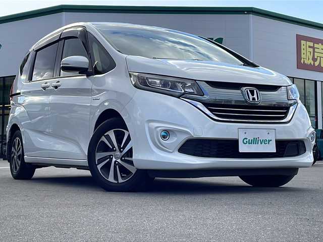 ホンダ フリード＋ ハイブリット EX 長野県 2017(平29)年 9万km ホワイトオーキッドパール 禁煙車/純正ナビ【VXM-185VFNi】/(CD/DVD/フルセグTV/Bluetooth)/ホンダセンシング/・衝突軽減ブレーキ/・歩行者事故低減ステアリング/・アダプティブクルーズコントロール/・車線維持支援システム/・路外逸脱抑制機能/・先行車発進お知らせ機能/・標識認識機能/バックカメラ/ビルトインETC/ドライブレコーダー/シートヒーター/両側パワースライドドア/革巻きステアリング/ステアリングスイッチ/LEDヘッドライト/フォグランプ/オートライト/スマートキー/Pスタート/電動格納ミラー/純正15インチAW/純正フロアマット