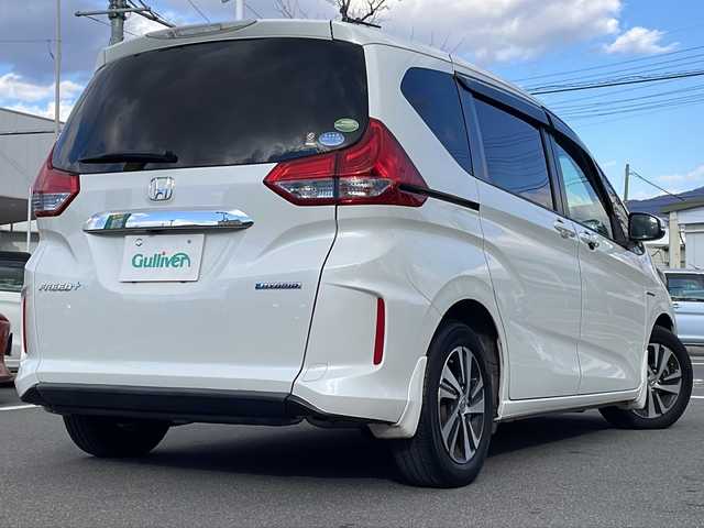 ホンダ フリード＋ ハイブリット EX 長野県 2017(平29)年 9万km ホワイトオーキッドパール 禁煙車/純正ナビ【VXM-185VFNi】/(CD/DVD/フルセグTV/Bluetooth)/ホンダセンシング/・衝突軽減ブレーキ/・歩行者事故低減ステアリング/・アダプティブクルーズコントロール/・車線維持支援システム/・路外逸脱抑制機能/・先行車発進お知らせ機能/・標識認識機能/バックカメラ/ビルトインETC/ドライブレコーダー/シートヒーター/両側パワースライドドア/革巻きステアリング/ステアリングスイッチ/LEDヘッドライト/フォグランプ/オートライト/スマートキー/Pスタート/電動格納ミラー/純正15インチAW/純正フロアマット