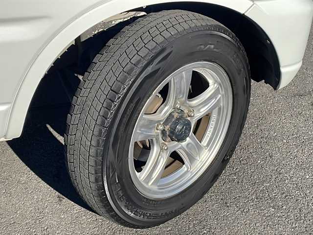 スズキ ジムニー クロスアドベンチャー XC 長野県 2011(平23)年 17万km パールホワイト ４WD/メモリナビ/ETC/社外16インチアルミ/保証書・取説