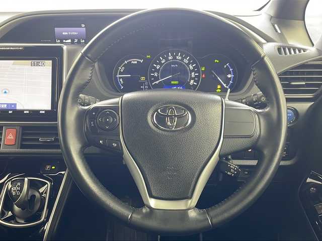 トヨタ ヴォクシー ハイブリッド ZS 煌Ⅲ 岐阜県 2020(令2)年 4.1万km イナズマスパーキングブラックガラスフレーク 純正９インチナビ　NSZT-Y68T/CD/DVD/Bluetooth/フルセグTV/バックカメラ　/両側パワースライドドア　/衝突軽減ブレーキ　/レーンキープアシスト　/クリアランスソナー　/パーキングサポートブレーキ　/先行車発進通知　/オートLEDライト　/オートハイビーム　/クルーズコントロール　/ETC　/前後ドライブレコーダー/ハーフレザー調シート　/前席シートヒーター/ステアリングスイッチ/純正１６インチアルミホイール