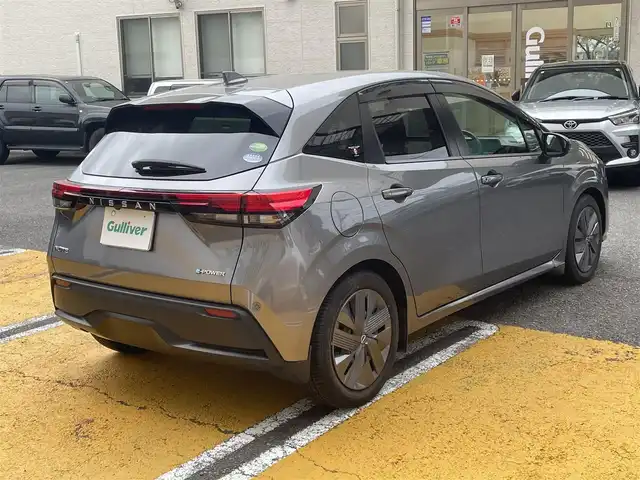 日産 ノート X 静岡県 2021(令3)年 1.6万km ダークメタルグレー ワンオーナー/純正ナビ/フルセグTV/CD/SD/BT/バックカメラ/エマージェンシーブレーキ/レーンキープアシスト/オートハイビーム/クリアランスソナー/前後ドライブレコーダー/ビルトインETC/ステアリングスイッチ/スマートキー×2/保証書/取扱説明書/ナビ取扱説明書/R6点検記録簿有