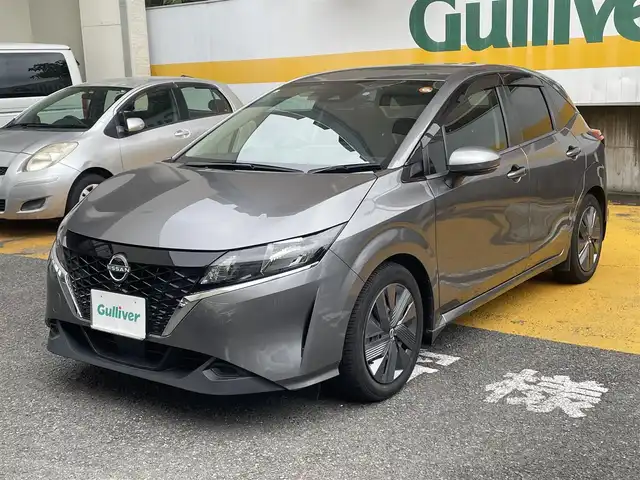 日産 ノート X 静岡県 2021(令3)年 1.6万km ダークメタルグレー ワンオーナー/純正ナビ/フルセグTV/CD/SD/BT/バックカメラ/エマージェンシーブレーキ/レーンキープアシスト/オートハイビーム/クリアランスソナー/前後ドライブレコーダー/ビルトインETC/ステアリングスイッチ/スマートキー×2/保証書/取扱説明書/ナビ取扱説明書/R6点検記録簿有