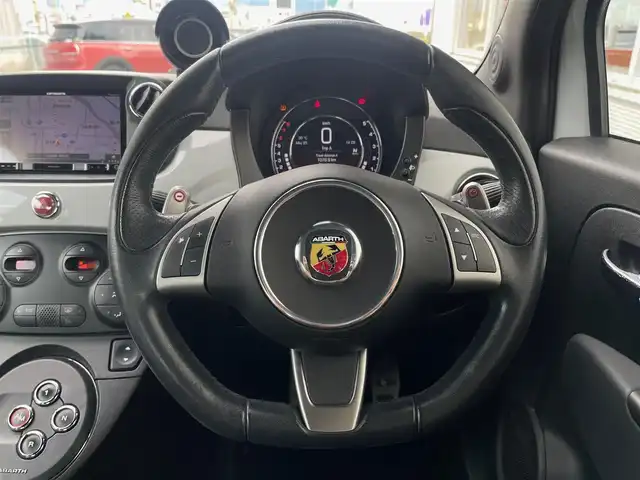 アバルト ５９５ ツーリズモ 山梨県 2016(平28)年 4.8万km グレー 登録時走行距離：47179km/カロッツェリアメモリナビ/　CD DVD BT フルセグTV/バックカメラ/レザーシート/HIDヘッドライト/フォグランプ/リアフォグ/ETC/革巻きステアリング/ステアリングスイッチ/パドルシフト/アルミペダル/リモコンキー/スペアキー
