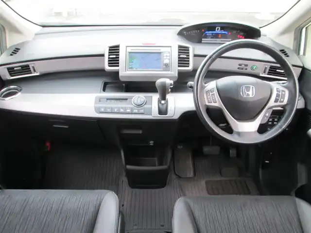 ホンダ フリード ハイブリット ジャストセレクション 千葉県 2012(平24)年 4.6万km プレミアムホワイトパール ワンオーナー/純正ナビ、ワンセグTV/バックカメラ/純正オーディオ【DVD/CD/SD/USB】/両側パワースライドドア/HIDヘッドライト/クルーズコントロール/前後コーナーセンサー/ハーフレザーシート/革巻きステアリング/ナビ連動ステアリングスイッチ/前方ドライブレコーダー/ETC、スペアキー/取扱説明書/ナビ取扱説明書/新車時保証書/ホンダ整備記録簿(H25/26/27/28/30/R2/5/6)