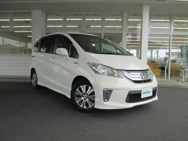 ホンダ フリード ハイブリット ジャストセレクション 千葉県 2012(平24)年 4.6万km プレミアムホワイトパール ワンオーナー/純正ナビ、ワンセグTV/バックカメラ/純正オーディオ【DVD/CD/SD/USB】/両側パワースライドドア/HIDヘッドライト/クルーズコントロール/前後コーナーセンサー/ハーフレザーシート/革巻きステアリング/ナビ連動ステアリングスイッチ/前方ドライブレコーダー/ETC、スペアキー/取扱説明書/ナビ取扱説明書/新車時保証書/ホンダ整備記録簿(H25/26/27/28/30/R2/5/6)