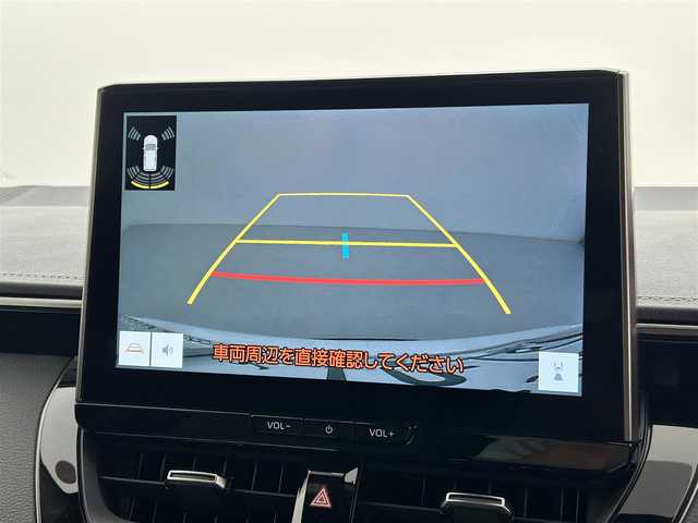 トヨタ カローラツーリング ハイブリッド ダブルバイビー 福井県 2023(令5)年 0.1万km プラチナホワイトパールマイカ 純正ディスプレイオーディオ　/BT Miracast フルセグTV FM AM /スペアキー　/バックカメラ　/トヨタセーフティセンス　/アダプティブクルーズコントロール　/ビルトインETC2.0/ブラインドスポットモニター/電動パーキングブレーキ/前後コーナーセンサー/前席シートヒーター /オートライト/ハーフレザーシート/革巻きステアリング/ステアリングヒーター/純正フロアマット/ドアバイザー