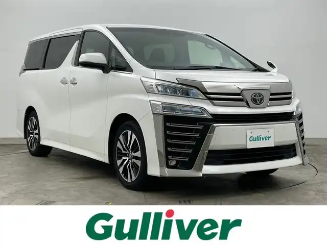 トヨタ ヴェルファイア Z Gエディション 岡山県 2020(令2)年 5.3万km ホワイトパールクリスタルシャイン 純正ディスプライオーディオ/【CD/DVD/USB/Bluetooth/フルセグTV】/ナビ機能付き/純正フリップダウンモニター/バックカメラ/ビルトインETC/純正ドライブレコーダー/両側パワースライドドア/パワーバックドア/黒レザーシート/前席シートヒーター/前席エアシート/N席＆2列目オットマンシート/衝突軽減ブレーキ/レーダークルーズコントロール/レーンキープアシスト/オートハイビーム/LED三眼ヘッドライト/LEDフォグランプ/純正18インチAW