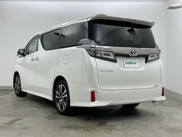 トヨタ ヴェルファイア Z Gエディション 岡山県 2020(令2)年 5.3万km ホワイトパールクリスタルシャイン 純正ディスプライオーディオ/【CD/DVD/USB/Bluetooth/フルセグTV】/ナビ機能付き/純正フリップダウンモニター/バックカメラ/ビルトインETC/純正ドライブレコーダー/両側パワースライドドア/パワーバックドア/黒レザーシート/前席シートヒーター/前席エアシート/N席＆2列目オットマンシート/衝突軽減ブレーキ/レーダークルーズコントロール/レーンキープアシスト/オートハイビーム/LED三眼ヘッドライト/LEDフォグランプ/純正18インチAW