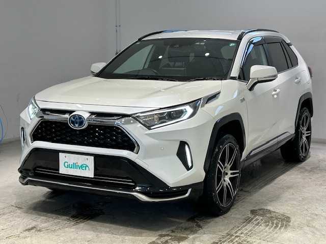 トヨタ ＲＡＶ４ ＰＨＶ G Z 宮城県 2021(令3)年 4.3万km ホワイトパールクリスタルシャイン ガーニッシュ（フロント/サイド/リア）/トヨタセーフティーセンス/・車線逸脱警報装置/・ブラインドスポットモニター/・プリクラッシュセーフティ/・パーキングサポートブレーキ/・ロードサインアシスト/・先行車発進告知機能/純正ナビ/・フルセグTV/・Bluetooth/USB/・全方位カメラ/・2.0ETC/・ドライブレコーダー（前後）/・純正充電ケーブル/・100V充電/アイドリングストップ/電子パーキング/・オートブレーキホールド/革巻きステアリング/・ステアリングスイッチ/レザーシート/・パワーシート（運転席/助手席）/・エアシート（運転席/助手席）/・シートヒーター（運転席/助手席）/LEDヘッドライト/・オートハイビーム/・オートライト/純正フロアマット