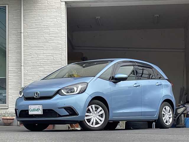 ホンダ フィット ホーム 大分県 2022(令4)年 0.7万km ライトブルー ワンオーナー /純正ナビ/Bluetooth/純正LEDヘッドライト/オートライト/純正フロアマット/ドラレコ/衝突被害軽減ブレーキ/横滑り防止装置/ドラレコ/バックカメラ/クルーズコントロール
