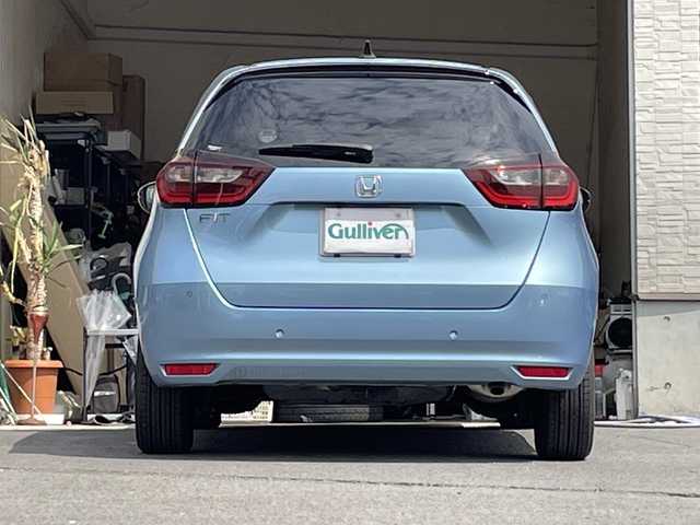 ホンダ フィット ホーム 大分県 2022(令4)年 0.7万km ライトブルー ワンオーナー /純正ナビ/Bluetooth/純正LEDヘッドライト/オートライト/純正フロアマット/ドラレコ/衝突被害軽減ブレーキ/横滑り防止装置/ドラレコ/バックカメラ/クルーズコントロール
