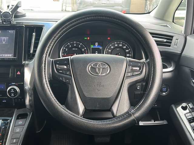 トヨタ ヴェルファイア Z 沖縄県 2016(平28)年 5.1万km ホワイトパールクリスタルシャイン 純正ナビ・TV・Bluetooth・CD・DVD/フリップダウンモニター/両側パワースライドドア/バックカメラ/ETC/コーナーセンサー/オートライト/電子サイドブレーキ/オートホールド/電動格納ミラー