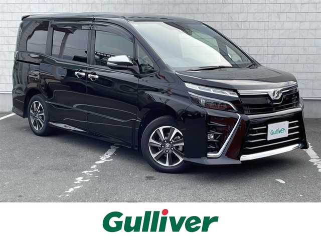 トヨタ ヴォクシー ZS 煌Ⅱ 三重県 2019(令1)年 2.3万km ブラック ・純正SDメモリーナビ/・フルセグTV CD DVD BT/・バックカメラ/・ETC2.0/・クルーズコントロール/・レーンキープアシスト/・コーナーセンサー/・両側パワースライド/・純正１６インチAW/・LEDヘッドライト/・ウォークスルー/・充電器USBポート/・取扱説明書/・保証書