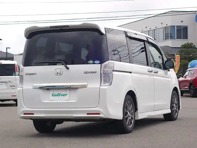 ホンダ ステップワゴン スパーダ Z クールスピリット 山形県 2012(平24)年 9.6万km ホワイトオーキッドパール アルパイン9.0インチ後席モニター (パッケージ-M900C)/純正ナビ/　　【CD DVD フルセグ】/バックカメラ/両側パワースライドドア/クルーズコントロール/HIDオートヘッドライト/ハーフレザーシート/16インチアルミホイール/アイドリングストップ/ステアリングスイッチ/パドルシフト/電動格納ウィンカーミラー/フォグランプ/スマートキー×2/ETC