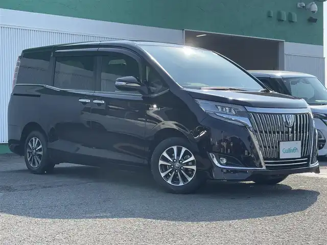 トヨタ エスクァイア ハイブリッド Gi 徳島県 2019(平31)年 3.3万km ボルドーマイカメタリック ワンオーナー車　/ヨタセーフティセンス　/９型純正ナビゲーション　/純正リヤフリップダウンモニター/バックモニター　/レザーシート/両席シートヒーター/EV＆ECO＆パワーモード切替/両側パワースライドドア/トラクションコントロール/クルーズコントロール/ウィンカーミラー/オート電動格納ミラー/ビルトインＥＴＣ　/ＬＥＤヘッドライト　/フォグランプ　/メッキドアハンドル/革巻きウッドコンビハンドル　/ステアリングリモコン/プッシュスタート　/スマートキー　/スペアキー　/純正フロアマット/サイドバイザー